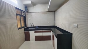 Kitchen in 2 BHK Apartment at Cosmos Jewels, Ghodbunder Road – for Rent