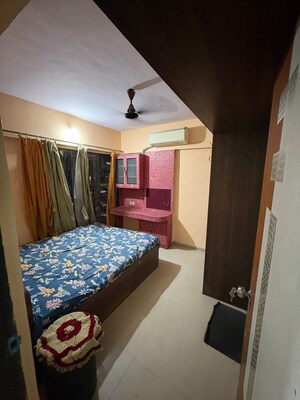 Bedroom in 2 BHK Apartment at Chandak 34 Park Estate, Goregaon West – for Rent