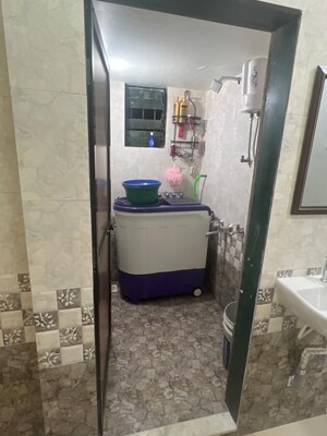 Bathroom in 2 BHK Apartment at Sahyog Tower, Kausa – for Sale