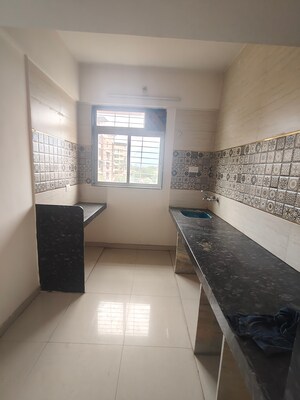 Kitchen in 2 BHK Apartment at Patel Ram Ambar, Ambernath East – for Rent