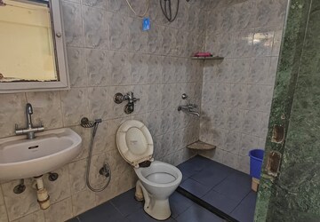 Bathroom in 2 BHK Apartment at Galaxy Tower, Waghbil – for Rent