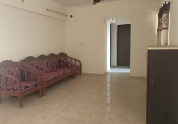 Living Room in 1 BHK Apartment at Lodha Downtown, Dombivli East – for Rent