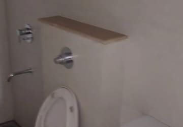 Bathroom in 2 BHK Apartment at Lodha Nautica, Dombivli East – for Rent