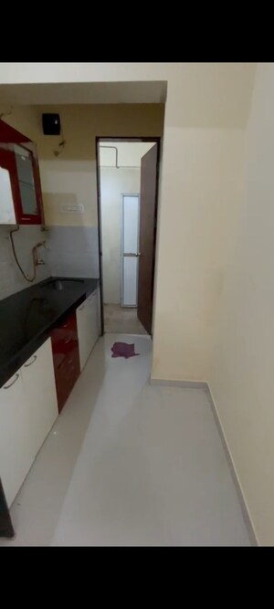 Kitchen in 1 BHK Apartment at Bhoomi Acres, Thane West – for Rent