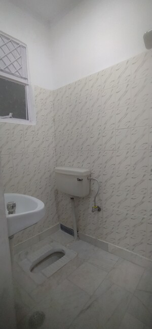 Bathroom in 2 BHK Builder Floor at Khirki Extension – for Rent