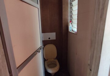 Bathroom in 1 BHK Apartment at Kanchan Pushp Society, Ghodbunder Road – for Rent