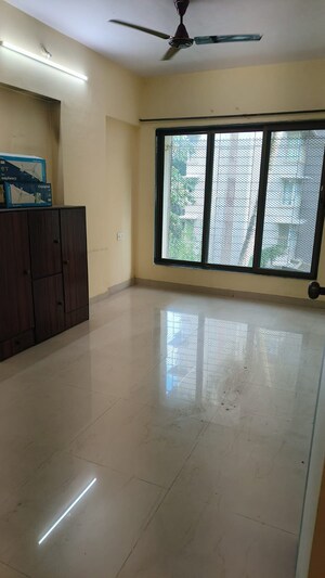 Room in 2 BHK Apartment at Rupali CHS, Malad West – for Rent