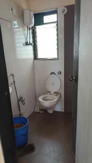 Bathroom in 2 BHK Apartment at Rupali CHS, Malad West – for Rent