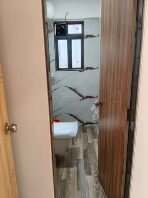 Bathroom in 1 BHK Apartment at Sayba Swarna, Nehru Nagar – for Rent
