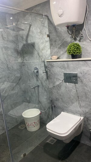Bathroom in 4 BHK Builder Floor at Palam Vihar Residents Association, Palam Vihar – for Rent