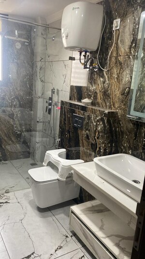 Bathroom in 4 BHK Builder Floor at Palam Vihar Residents Association, Palam Vihar – for Rent