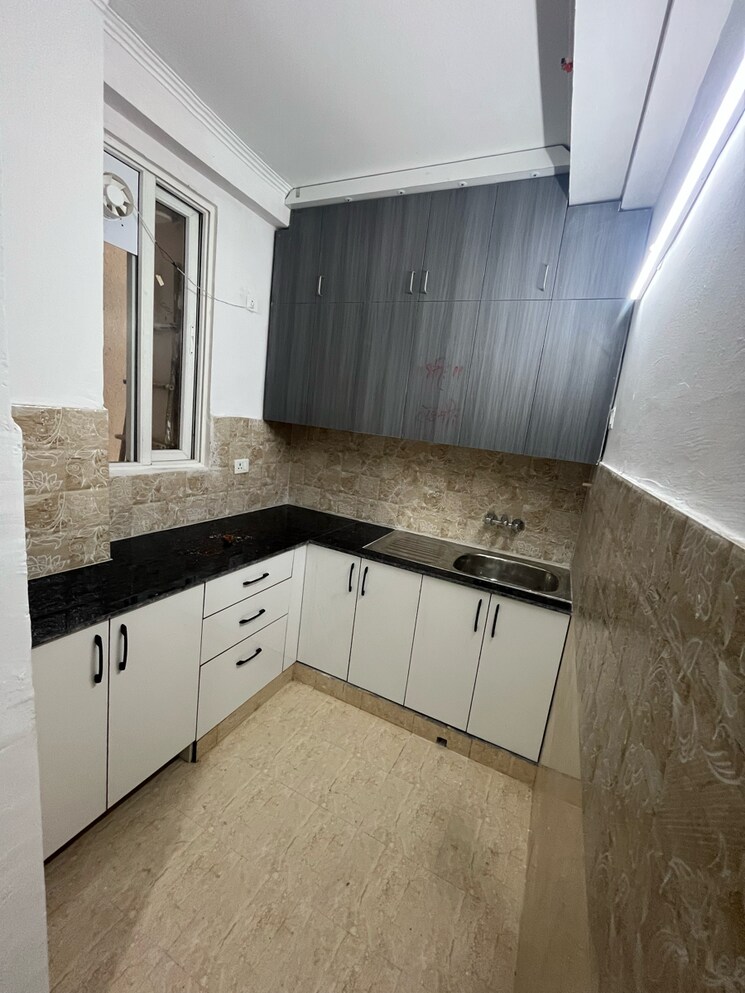 Kitchen, amrapali-golf-homes 2 Bedroom 835 Sq.Ft. Apartment In Haibatpur Greater Noida 9349300