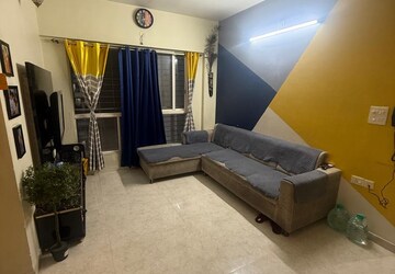 Living Room in 1.5 BHK Apartment at Lodha Amara, Kolshet Road – for Sale