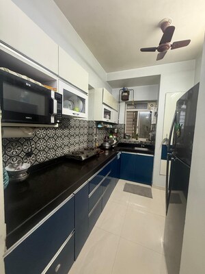 Kitchen in 1.5 BHK Apartment at Lodha Amara, Kolshet Road – for Sale
