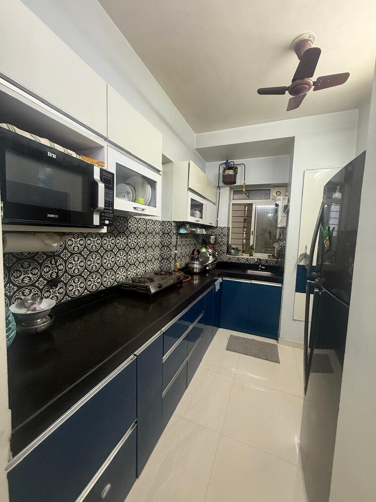 Kitchen, lodha-amara 1.5 Bedroom 585 Sq.Ft. Apartment In Kolshet Road Thane 9349383