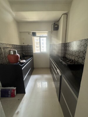 Kitchen in 1 BHK Apartment at Lodha Amara, Kolshet Road – for Sale