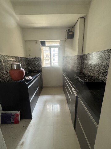 Kitchen in 1 BHK Apartment at Lodha Amara, Kolshet Road – for Sale