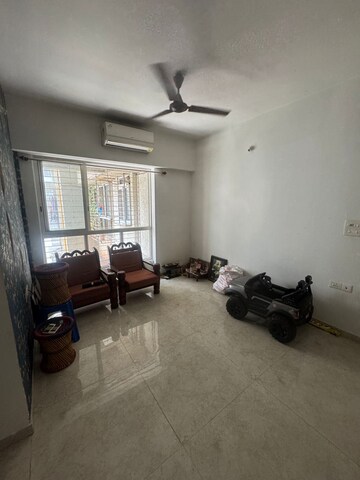 Living Room in 1 BHK Apartment at Lodha Amara, Kolshet Road – for Sale