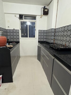 Kitchen in 1 BHK Apartment at Lodha Amara, Kolshet Road – for Sale