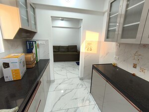 Kitchen in 1 BHK Apartment at Raymond Ten X Habitat, Pokhran Road No Two – for Rent