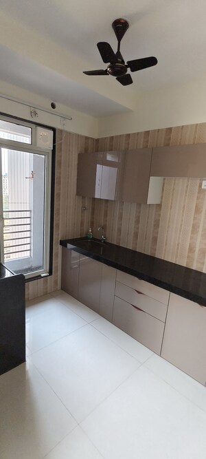 Kitchen in 2 BHK Apartment at Sheth Athena, Laxmi Nagar – for Rent