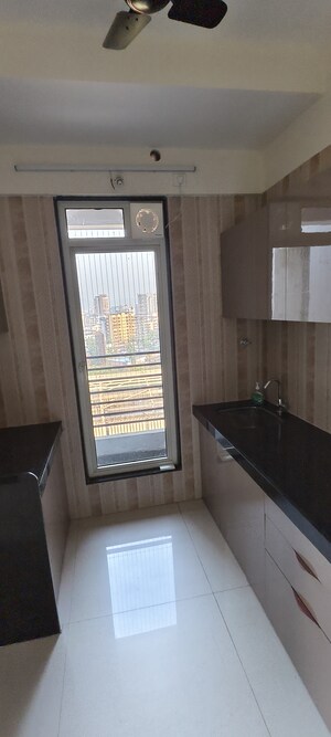 Kitchen in 2 BHK Apartment at Sheth Athena, Laxmi Nagar – for Rent