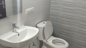 Bathroom in 3 BHK Apartment at Omaxe The Palace, Gomti Nagar – for Sale