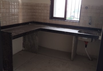 Kitchen in 1 BHK Apartment at Dosti Planet North Onyx, Shilphata – for Rent
