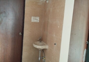 Utility Room in 1 BHK Apartment at Dosti Planet North Onyx, Shilphata – for Rent