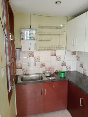 Kitchen in 1.5 BHK Builder Floor at Sector 18 – for Rent