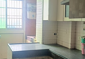 Kitchen in 2 BHK Apartment at Antriksh Golf View, Sector 78 – for Rent
