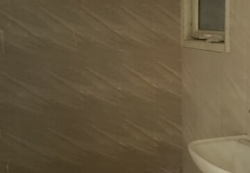 Bathroom in 2 BHK Apartment at Antriksh Golf View, Sector 78 – for Rent