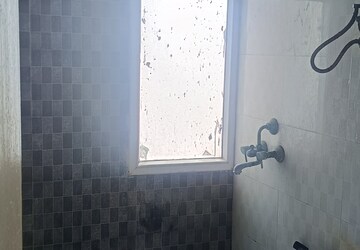 Bathroom in 2 BHK Apartment at Antriksh Golf View, Sector 78 – for Rent