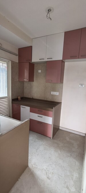 Kitchen in 1.5 BHK Apartment at Dosti West County, Balkum Pada – for Rent