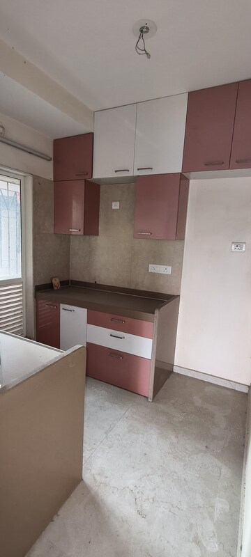 Kitchen in 1.5 BHK Apartment at Dosti West County, Balkum Pada – for Rent