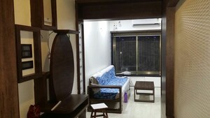 Living Room in 2 BHK Apartment at Kandivali East – for Rent