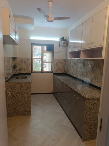 Kitchen in 2 BHK Apartment at Sheffield Towers, Andheri West – for Rent