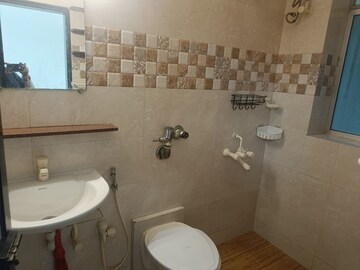 Bathroom in 2 BHK Apartment at Sheffield Towers, Andheri West – for Rent