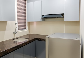 Kitchen in 3 BHK Apartment at DLF The Belaire, Sector 54 – for Sale
