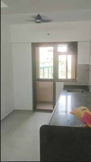 Kitchen in 2 BHK Apartment at Ganga New town, Dhanori – for Rent