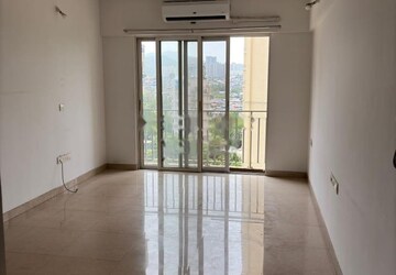 Room in 2 BHK Apartment at The Wadhwa Platina, Kolshet Road – for Rent