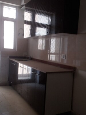 Kitchen in 2 BHK Apartment at Amrapali Zodiac, Sector 120 – for Sale
