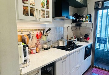 Kitchen in 5 BHK Apartment at Cosmos Hawaiian Village, Ghodbunder Road – for Sale