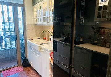 Kitchen in 5 BHK Apartment at Cosmos Hawaiian Village, Ghodbunder Road – for Sale