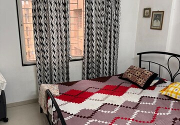 Bedroom in 2 BHK Apartment at GK Rose Woods, Pimple Saudagar – for Rent
