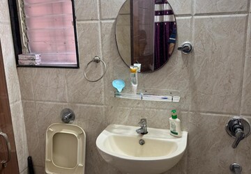 Bathroom in 2 BHK Apartment at GK Rose Woods, Pimple Saudagar – for Rent