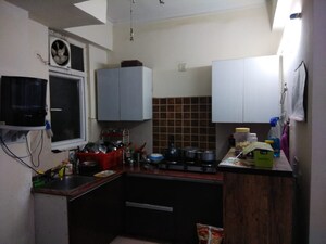Kitchen in 2.5 BHK Apartment at Amrapali Zodiac, Sector 120 – for Sale