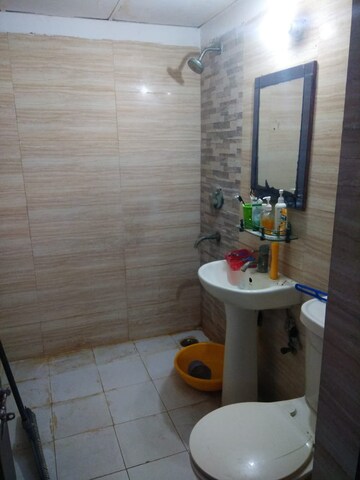 Bathroom in 2.5 BHK Apartment at Amrapali Zodiac, Sector 120 – for Sale