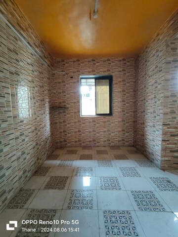 Bathroom in 2 BHK Apartment at Devta CHS, Kharigaon – for Rent