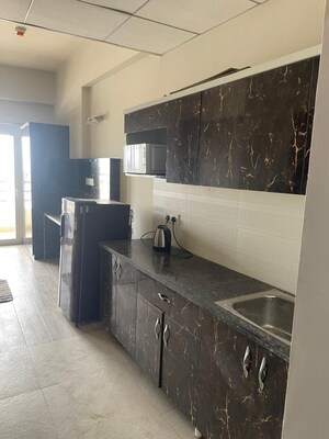 Kitchen in 1 BHK Apartment at Paramount Golfforeste, Zeta I Greater Noida – for Rent